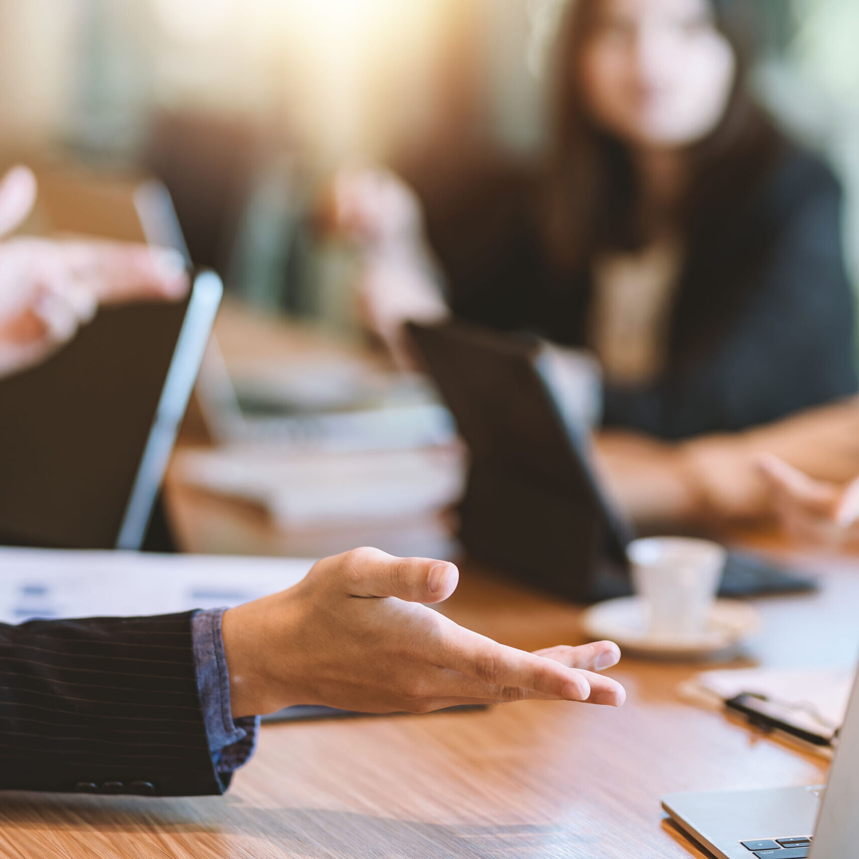 Business people meeting and planning business strategies together in the office.