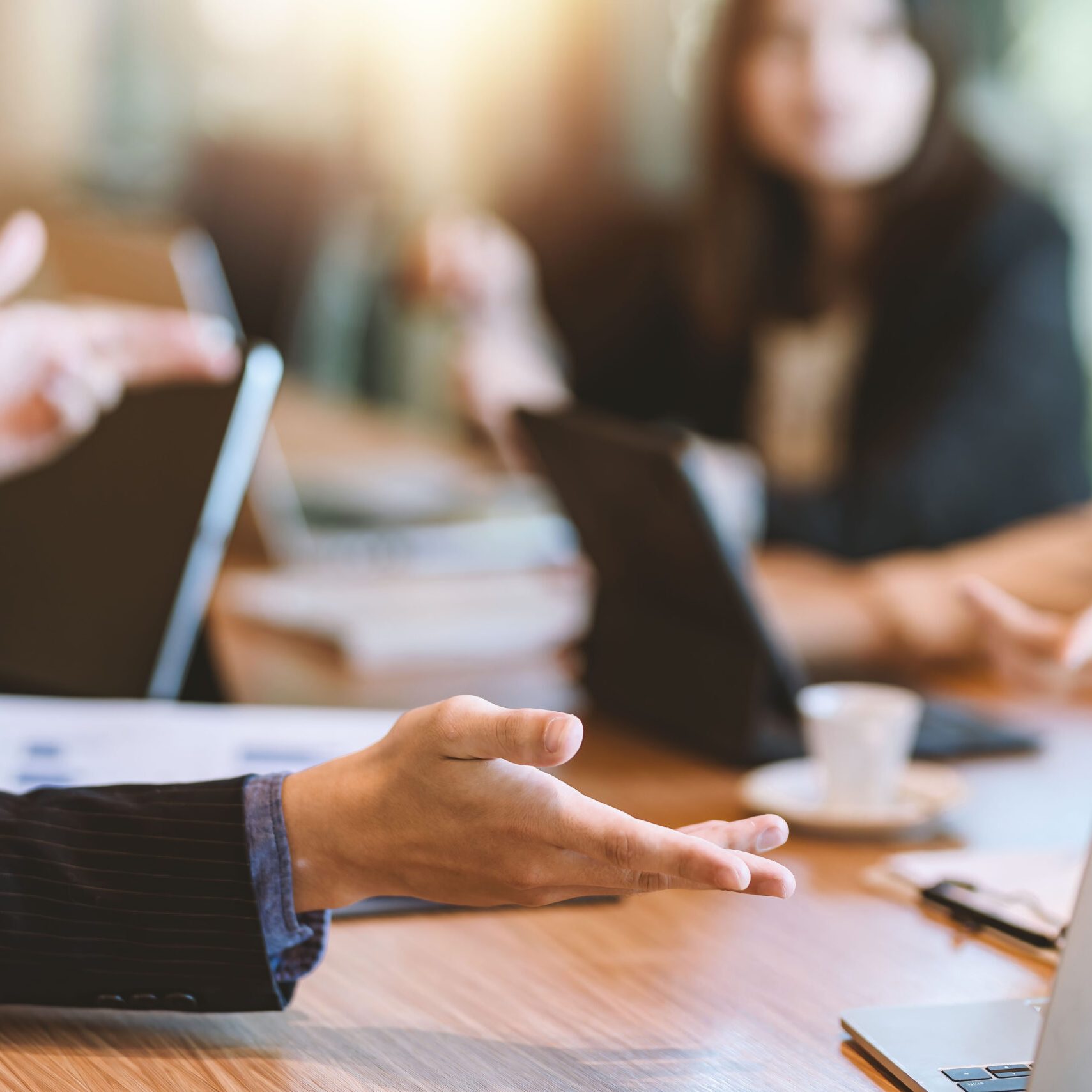 Business people meeting and planning business strategies together in the office.