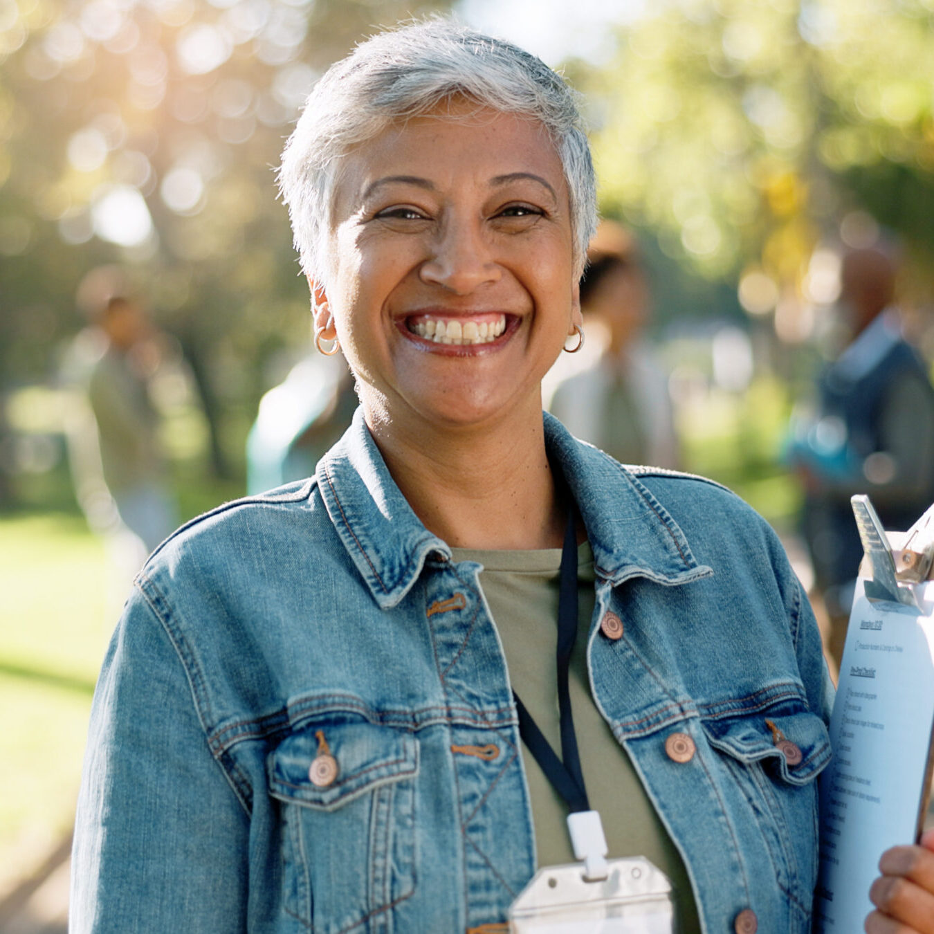 Charity, woman and portrait of volunteer with clipboard for waste checklist, inspection and community service. Female manager, park or nature for cleaning, nonprofit project and welfare with smile.